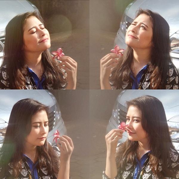 PrillyIG's tweet photo. #InstaPict "Candid by someone 😜 morning btw ☀️" cc: @PrillyBie http://t.co/yQxvnx72UC