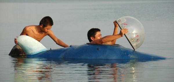 TelegraphPics's tweet photo. (Home)made in China: Ambitious Chinese inventors take on crazy do-it-yourself projects (Rex) http://t.co/JJAYN6w7pL http://t.co/8bgWE6fn6m