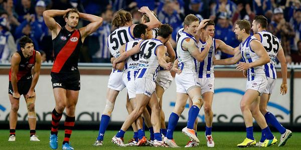 NMFCOfficial's tweet photo. All hail Drew Petrie! North wins its first final since 2007! #AFLFinals http://t.co/vIGyu0b9n6