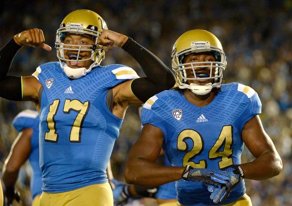SportsCenter's tweet photo. No. 11 UCLA survives scare, beats Memphis, 42-35. Brett Hundley throws for 396 Yds, 3 TD, 1 Int in win. http://t.co/BvofmYpc43