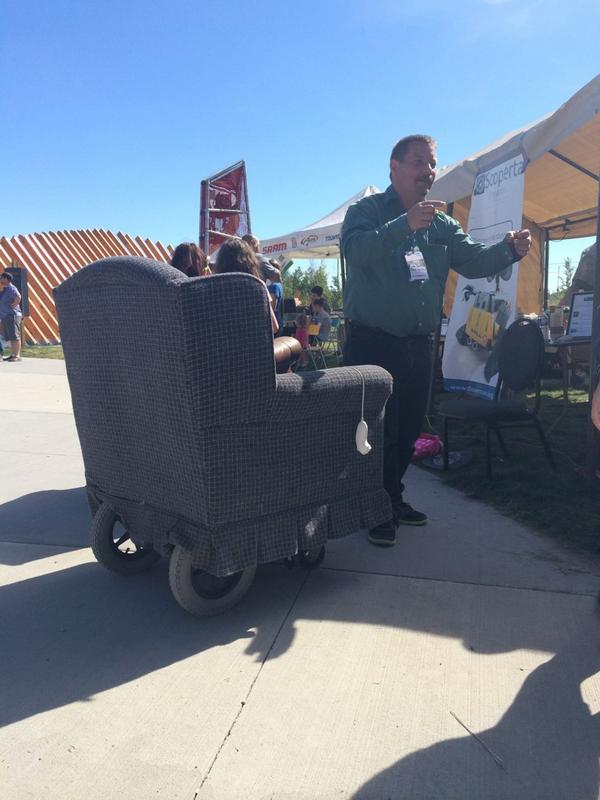 TELUS_Spark's tweet photo. What a lovely day for a ride on a motorized armchair with our pals at @ScopertaTerra! Join the fun. #mfyyc is on! http://t.co/g0E6fcUHqz