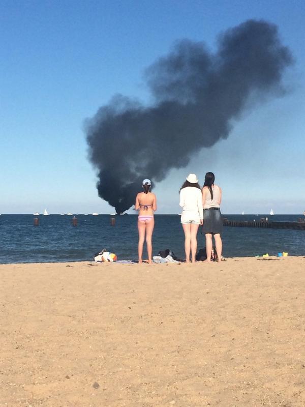 Boat fire on Lake Michigan by Fullerton beach!