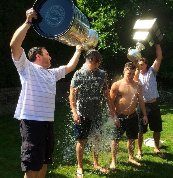 NHL_Pics's tweet photo. Bill Ranford and his nephew participate in the Ice Bucket Challenge with the Stanley Cup and Calder Cup http://t.co/OwWTaXAWIq