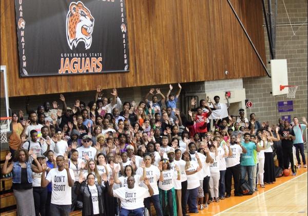 AurelioOnCampus's tweet photo. @Governors_State SWSO leads "Don't Shoot" #Ferguson Silent Protest. #GSULeaders #SocialJustice http://t.co/irp9MgSs5p