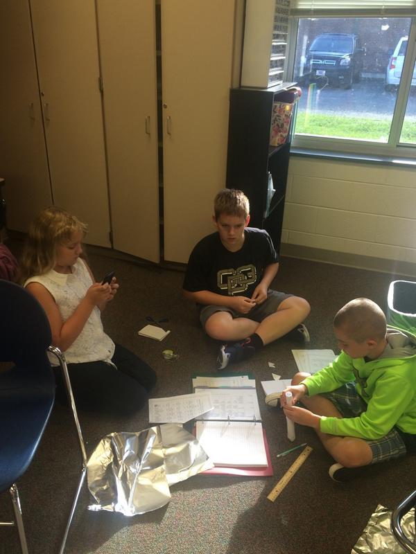 mrs_moores's tweet photo. "We have to build a rocket out of paper, foil, tape, and a straw??" @MMSMustangs14 #ssin805 #handsonmindson http://t.co/F4fkNvvFHY