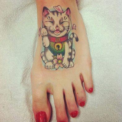 Time to get some new ink or metal for back to school, get your kitty kat waving goodbye on your first day