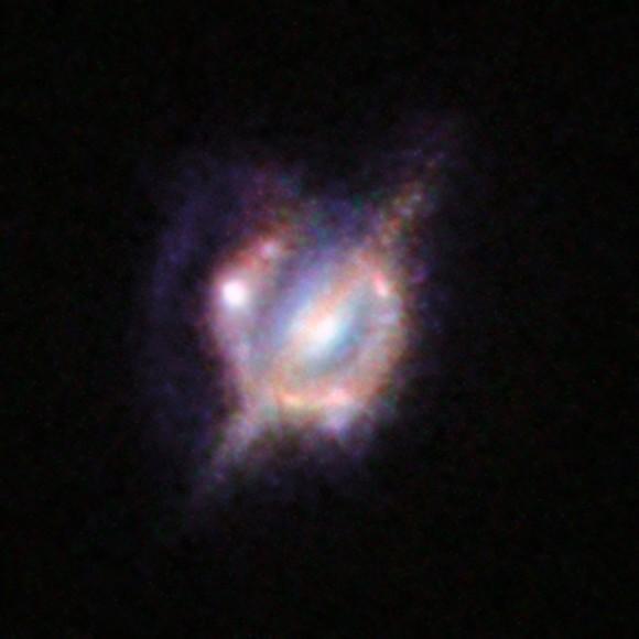 universetoday's tweet photo. A Cosmic Collision: Our Best View Yet of Two Distant Galaxies Merging

http://t.co/Xp3PqaNnTd http://t.co/MOBjMMEU50