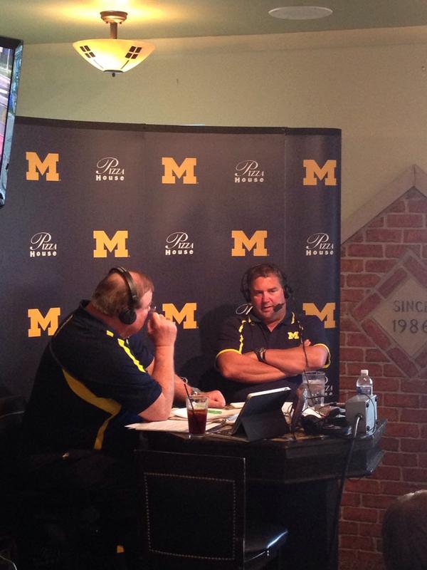 UMichFootball's tweet photo. Coach Hoke with Jim Brandstatter on 1st radio show of the year at Pizza House #GoBlue http://t.co/zLmVdkxnDI