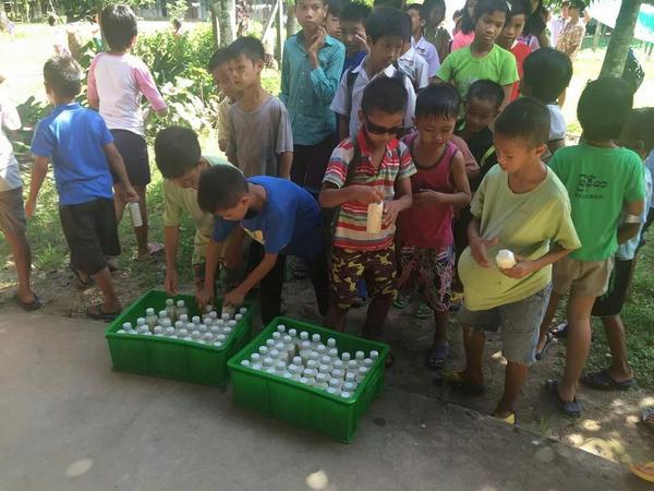 Here are a few more photos of soy milk in the hands of LCH orphans.  #soymilk