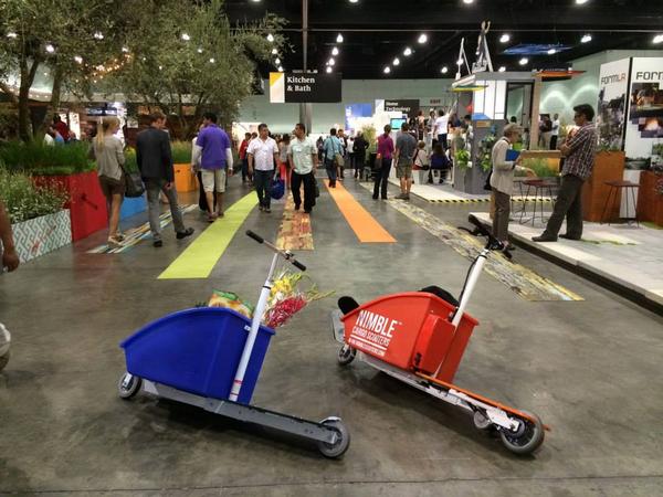 DwellonDesign's tweet photo. At #DOD2014, we used @nimblescooters—scooters with a handy cargo box—to get around the floor: http://t.co/3OL4AavZ6C http://t.co/V7wDKzCkbL