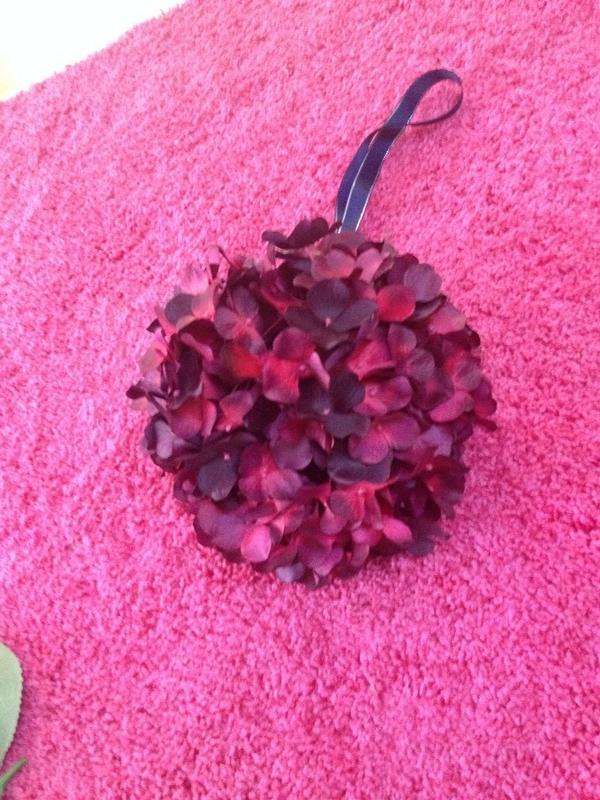 Natural deep reds for an autumn hanging kissing ball