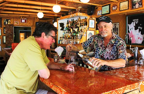 TravelWriterExm's tweet photo. Hamming it up on #Kauai's north shore at Tahiti Nui. For 10 more beauty shots: http://t.co/KG7CmpxDkU @examinercom http://t.co/U9gA3R19yv