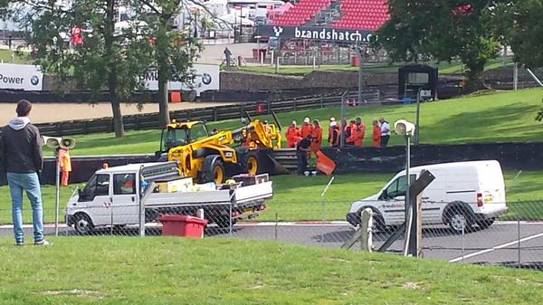wrightjames2410's tweet photo. @Brands_Hatch @MSVRacing how many people does it take to fix a barrier? http://t.co/hHXMA1eQIt