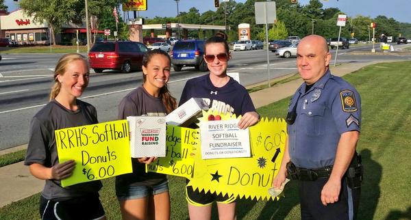WoodstockPD's tweet photo. Cpl. Oreto supporting a great cause with his purchase. Proceeds benefiting a local high school softball team! http://t.co/hgEgromrU9