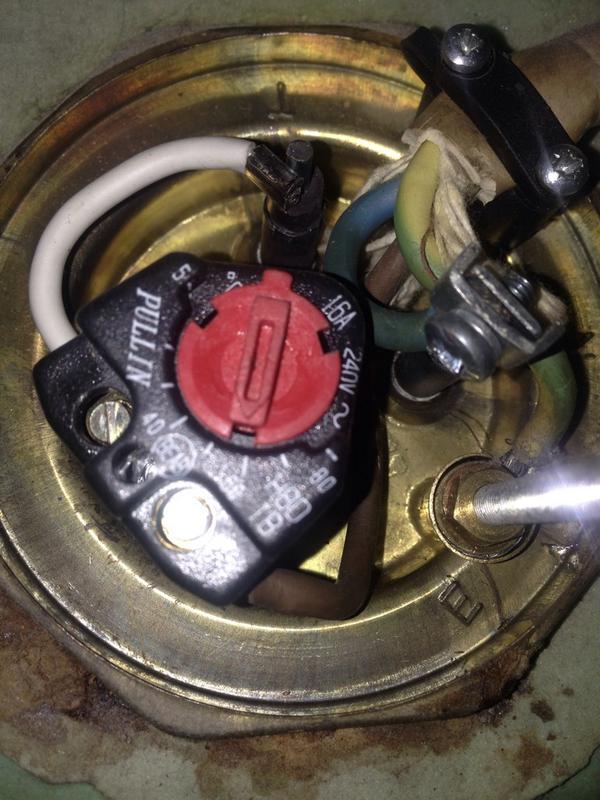 Old single thermostats in immersion heaters should be replaced with new double stats for extra safety. #electrician