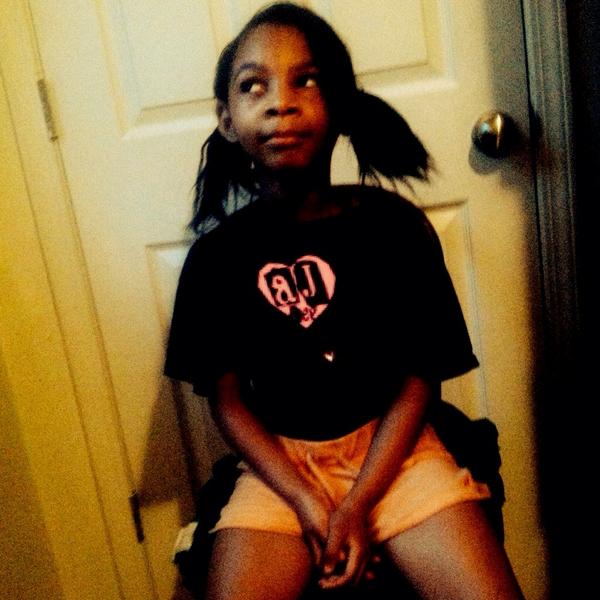 ivylea's tweet image. My niece with her @WWEAJLee shirt we both love her very much #morelikeouridol ❤️