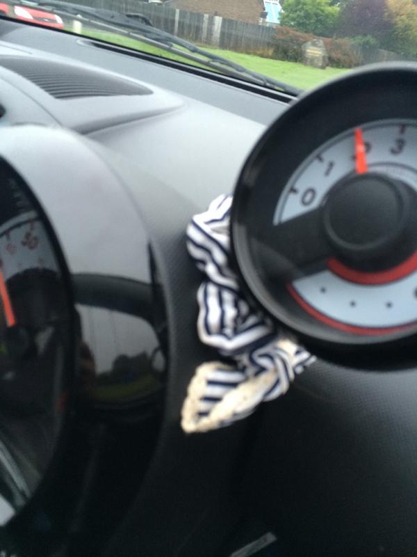 @dinoandpete hair band attached to my steering wheel #alwaysinneed #scrunchie