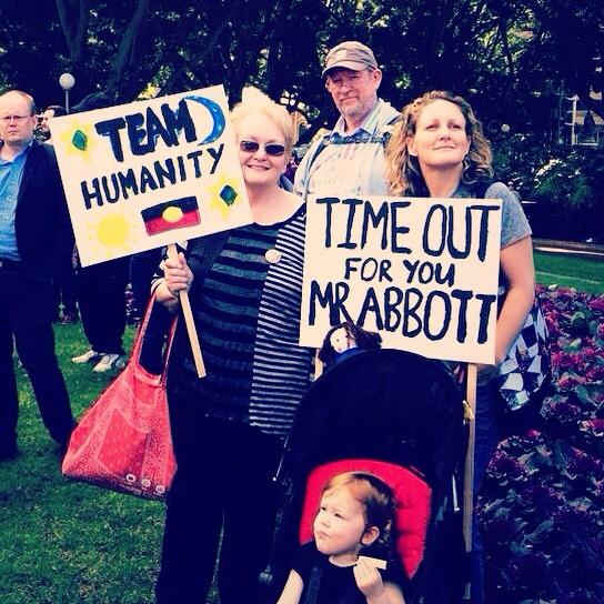 MarchAustralia's tweet photo. That's the beauty of a peaceful protest - thoughtful signs, all ages. #auspol #marchinaugust #marchaustralia http://t.co/IPFvHtnSV2