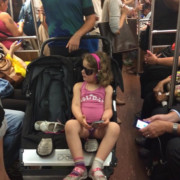 WiseLatinaBR's tweet image. Look at the size of this stroller on the orange line during rush hour. #mbta #orangelineproblems