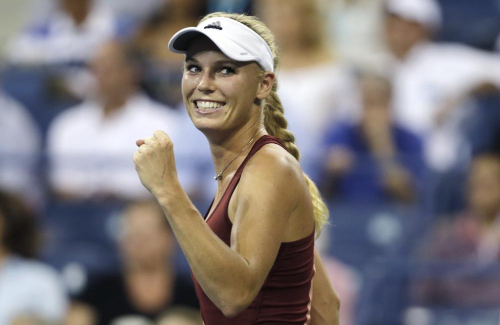 Caroline Wozniacki disses Victoria Azarenkas singing in post-match interview  