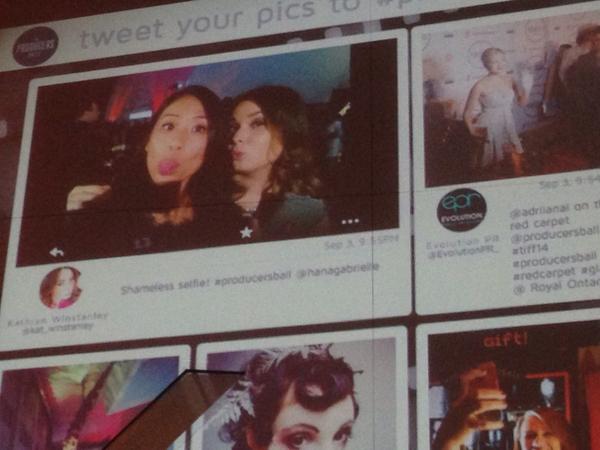 kat_winstanley's tweet photo. On the big screen at #producersball kicking off #TIFF14 @hanagabrielle http://t.co/h0DrnN3scB