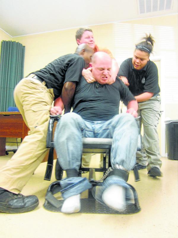 Local officers train on use of restrain chairs: bit.ly/1Ab5pn5