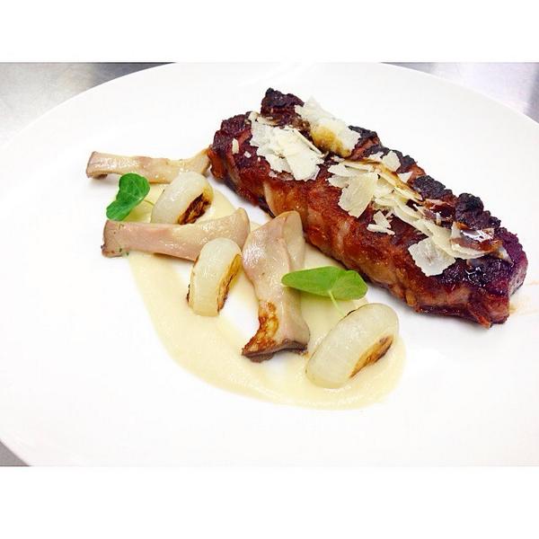 12oz dry aged Ontario Strip Loin with parmigiano, aceto tradizionale, preserved mushrooms, cipollini &amp; artichokes.