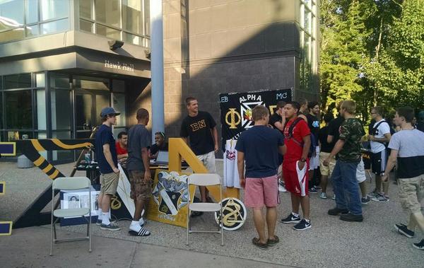SigmaNu_UHart's tweet photo. Brothers at the meet the Greeks table in alumni plaza! #UHart18 #UHartGreekLife http://t.co/qWYXuud1a5
