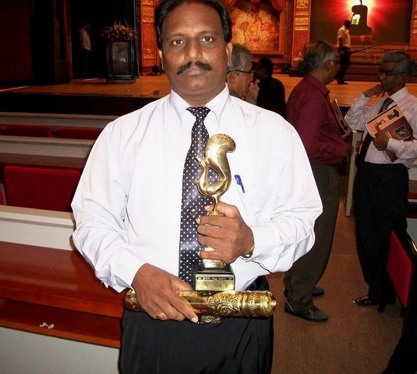 cpajaffna's tweet photo. #CPAJAFFNA Deputy director Mr.jonson rajkumar Got The shield for the book of "amaithip poonka" http://t.co/rUydYfeI1e