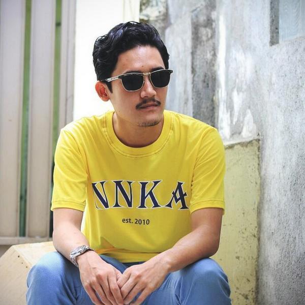 NNKA yellow shirt from <a href="/NNKA_/">NNKA</a> is available at PRIGEL (Rp125K)