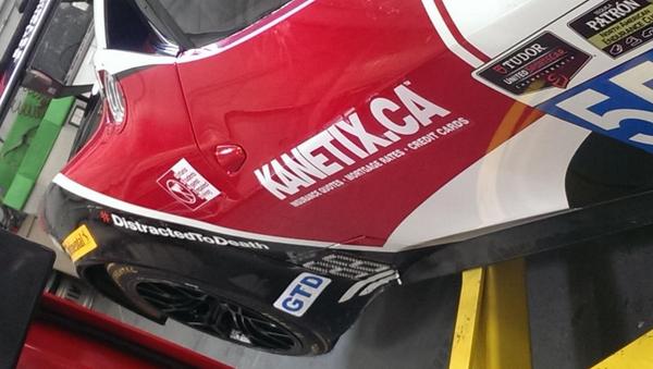 AIMautosport's tweet photo. All New decal on our @DriveSeriously #Ferrari @kanetix We look forward to Monday in #Toronto #DistractedtoDeath http://t.co/d7ZNfHoQ4Y