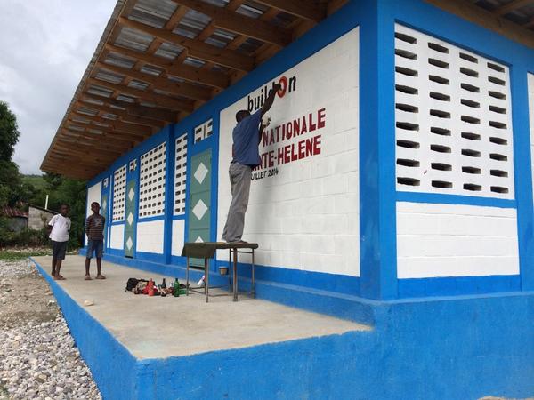 2 boys in rural Haiti watch as their new school is finished just in time 4 school to open Monday #BetterBack2School