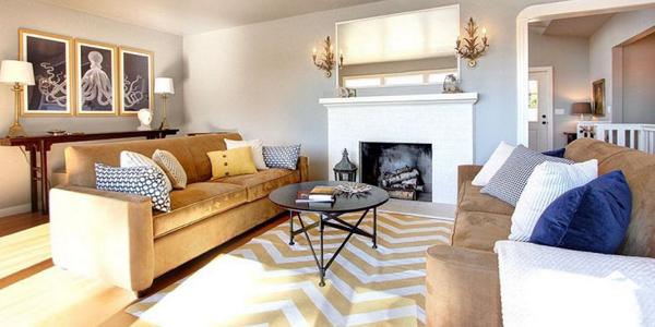 zillow's tweet image. To save money while decorating, watch the cost of rugs, lighting, curtains, art and pillows. | zlw.re/6013W73d