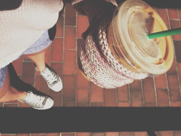 Starbucks's tweet image. Winter sweater, summer shorts. Cold coffee, warm hands. #confused #buthappy 🍂☀