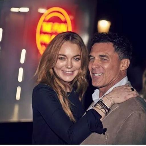 lohan_mexico's tweet photo. The inimitable #LindsayLohan with Andre Balasz enjoying #TheFunPalace at the britishvogue #LFW closing party http://t.co/BXnLBi3cXx