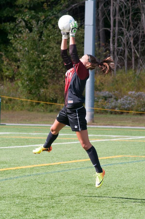 cgeorgephoto's tweet photo. @NHSHuskySports Jayne Lewis '16 leaps for the save during yesterdays tie game against @spsadmissions http://t.co/3AjuD59NiO