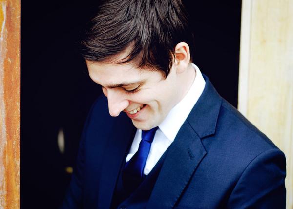 NobleSuitCo's tweet photo. Smiling like he knows a secret. Or maybe it's just the suit.  // navy blue 3-piece + classic white shirt #noblesuitco http://t.co/hN0h1HabVP