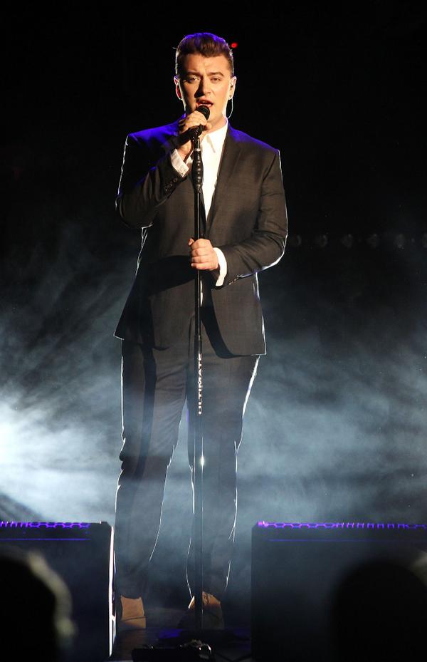 CalvinKlein's tweet photo. .@samsmithworld kicked off his North American Tour last night in a custom Calvin Klein Collection suit. http://t.co/UW1zOMQAum