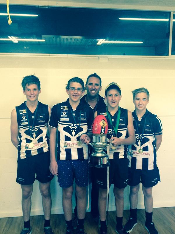 <a href="/MurrayFL/">Murray FL</a> Moama Under 14 coach and captains holding the 2014 premiership cup. Well done Mowers!!!!