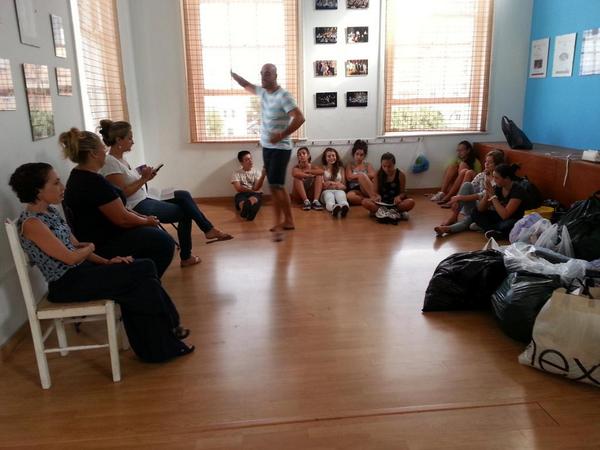Santosprod's tweet photo. Discussing our upcoming trip to cheshire homes before the clothes drive :) http://t.co/U3XQh3GE9F