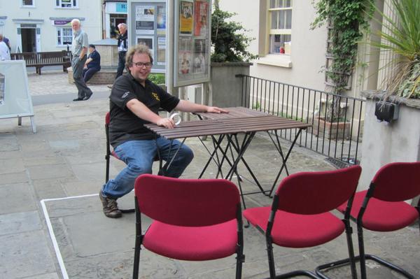 BridportFM's tweet photo. 1 week to go... Jonty was caught measuring out the size of the studio on the forecourt this afternoon. #bridportfm http://t.co/tH0mb3AV1e