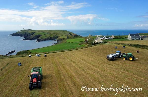 BirdseyeKite's tweet photo. @farmersjournal a bit of silage bailing going on at #GalleyHead  Photography from a #Kite http://t.co/u4g236r81Y