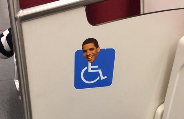 Complex's tweet image. Pasting Drake's head onto handicapped signs is the new thing to do in Toronto: trib.al/dPrOxfk