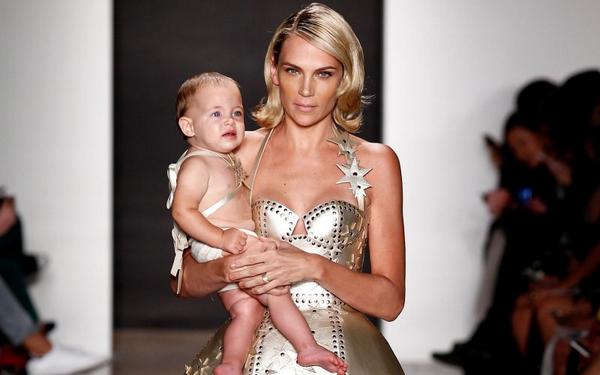 This year's hottest runway accessory: Babies thebea.st/1nIaa1N #NYFW