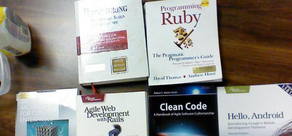 benroot's tweet photo. First book to read from this pile, I choose "Clean Code" http://t.co/YhNul3625L