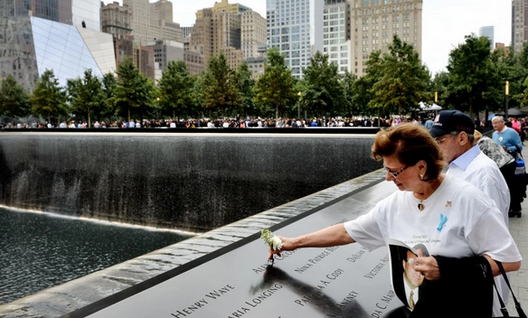 TheFutureForum's tweet photo. W/ the #WorldTradeCenter set to open later this year, Americans #Remember911 - http://t.co/UACyZdA9PU http://t.co/PblVbn86mT