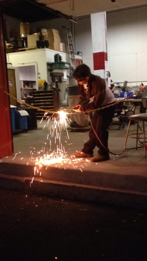 downtownSYR's tweet photo. Neat "ribbon" cutting! RT @thetechgarden: Ribbon cutting at the #SALTmaker space grand opening! #fireworks #StartUNY http://t.co/2yKfiBHoaY