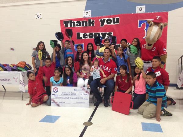 Rangers's tweet photo. Yaimira &amp; @leonys27martin donated baseball equipment to a deserving elementary school in Mesquite. #AHeartForKids http://t.co/AXqjaZ1qKO
