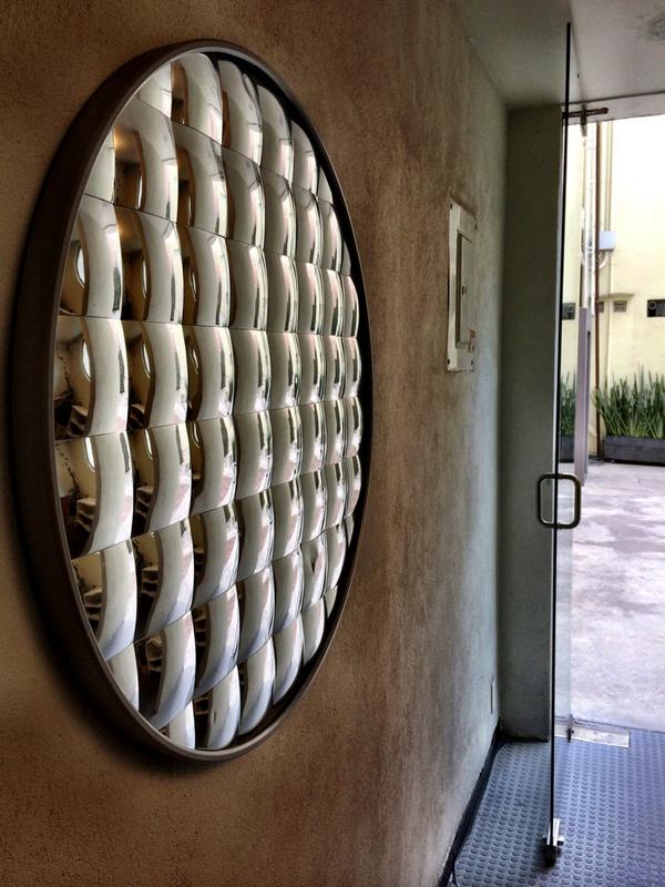sparkydill's tweet photo. You know you're at an architectural lighting design office when... large faceted reflector as art. At Lighteam http://t.co/U6xMTrTeZW