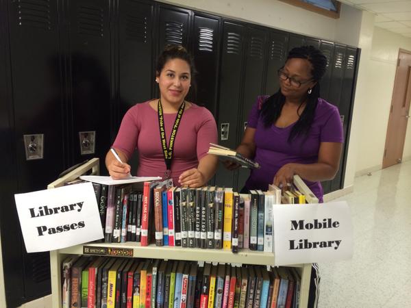 DISD_Libraries's tweet photo. Pinkston HS Librarians promoting #ILD14 with a mobile library. Going above and beyond to reach their #community! http://t.co/pbo6lzfiTB